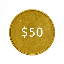 Load image into Gallery viewer, Gold-colored coin with white text '$50' centered, representing the Nugget Stacker Gold Subscription start price